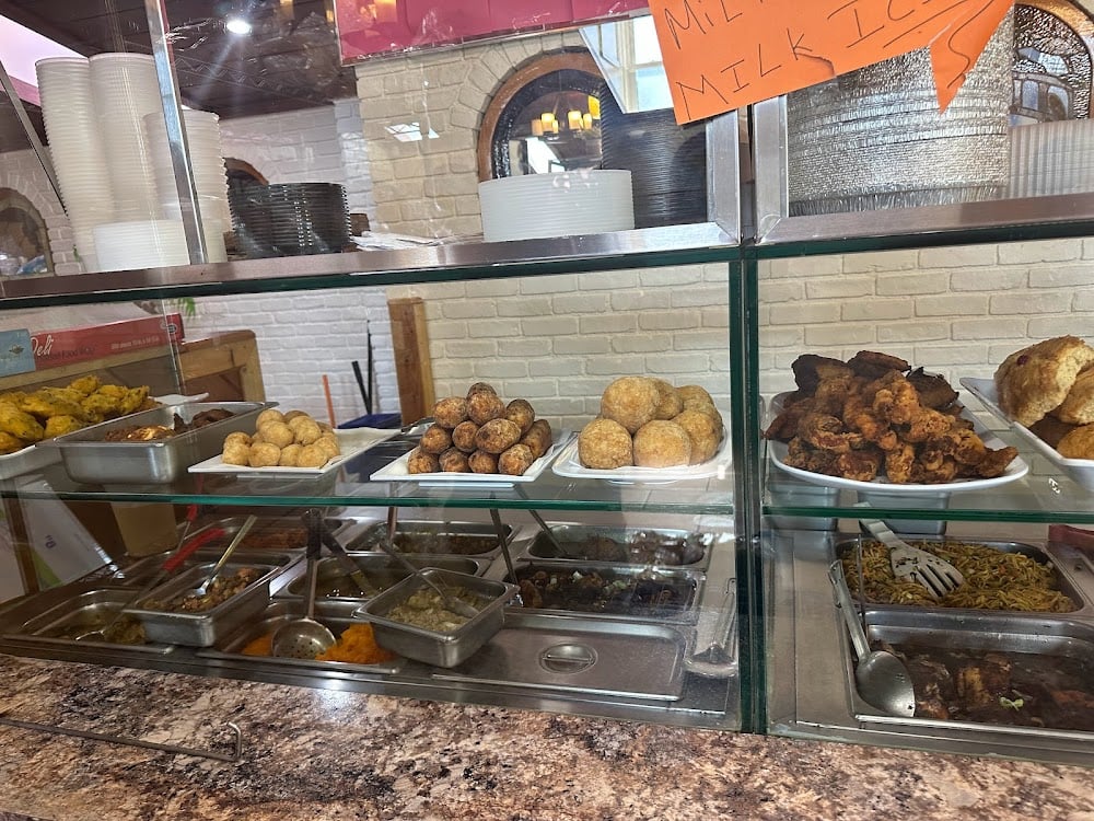 Family enjoying Caribbean food